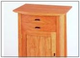 curved front cherry standing cabinet